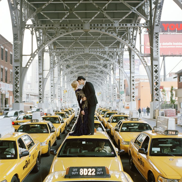 Edythe and Andrew Kissing on a Sea of Cabs