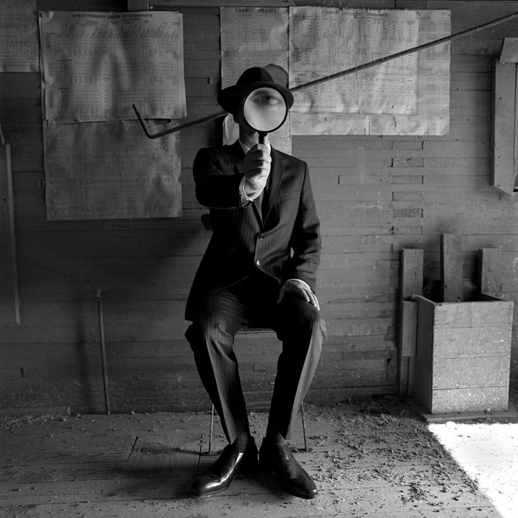Man with Magnifying Glass